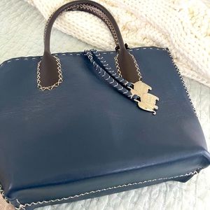 Tsonga navy purse with brown accents and stitching brand new